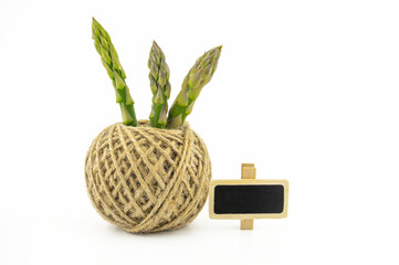 Asparagus spears near ball of natural hemp twine