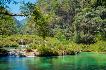 Fototapeta na wymiar Long exposure photograph of the Semuc Champey Cascades along the Cahabon river, Peten Rainforest, Guatemala. 