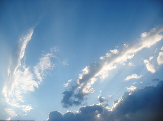 Naklejka na ściany i meble Blue sky, sun and clouds