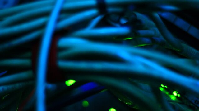 Working Ethernet switch close up. Blinking LED. 10/100/1000 Mpbs speed. Fully loaded and working fast. Top technology clip.