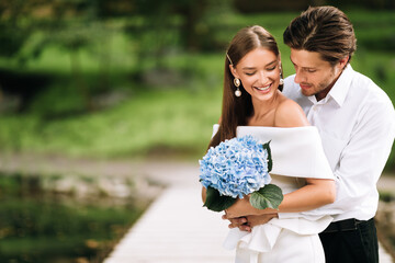 Wedding Couple Embracing In Park Having Minimalistic Just Us Ceremony
