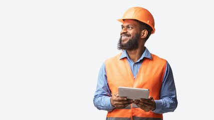 Cheerful Builder Holding Digital Tablet Posing On White Studio Background - Powered by Adobe
