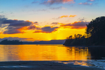 Fototapeta na wymiar Sunrise Time Scenery at Scandrett Beach Auckland New Zealand