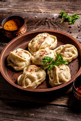 Traditional steamed dumplings Manti. Traditional Uzbek oriental cuisine. top view