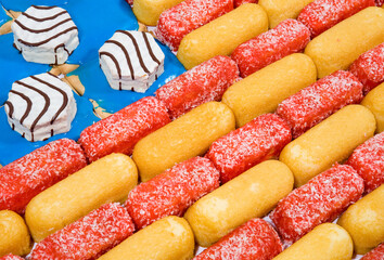 An American flag created from an assembly of snack cakes and other junk food.