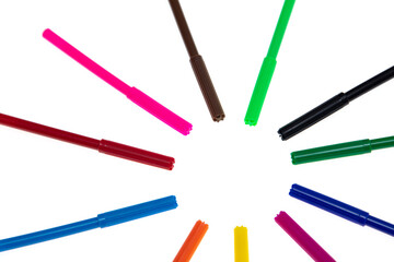 Colored felt-tip pens on a white background.