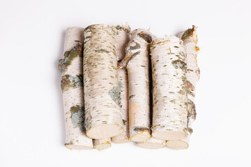 A pile of birch firewood on white background