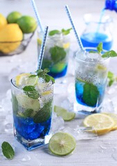 Blue mojito cocktail on white background
