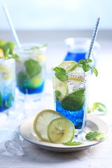 Blue mojito cocktail on white background