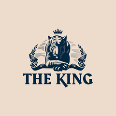 A calm tiger with a crown lies with its paw on its paw.