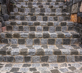 Masonry. Cobblestone staircase. Interesting background, texture. Vintage.