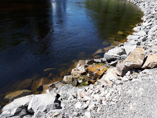 Stone coast along the river - Jevnaker, Kistefos 