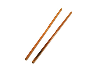 Close up of wooden chopsticks on white background