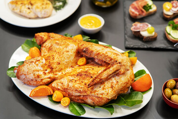 Baked half chicken.
