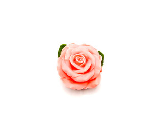 pink rose soap on white background.