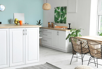 Interior of modern kitchen with stylish table