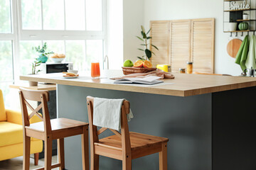 Interior of modern kitchen with stylish table