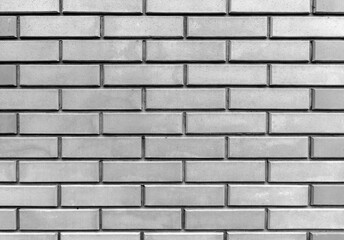 A neatly laid out brick wall. Brickwork.