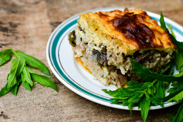  Potato shepherd's pie.  Potato and minced meat  Casserole  with   parmesan cheese and garlic on wooden rustic bakcgound. 
