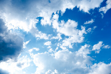 White and black clouds in the beautiful blue sky