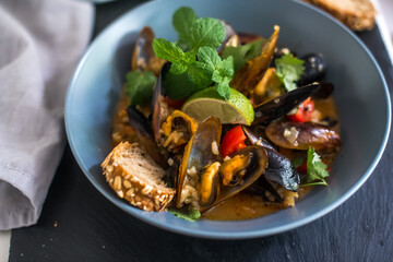 Cooked Mussels with rice and sauce