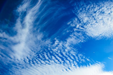 bright blue sky with beautiful white clouds.