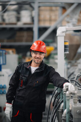 Portrait of worker in factory.

