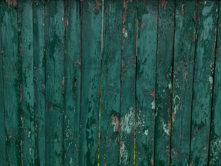 Old green wooden fence 