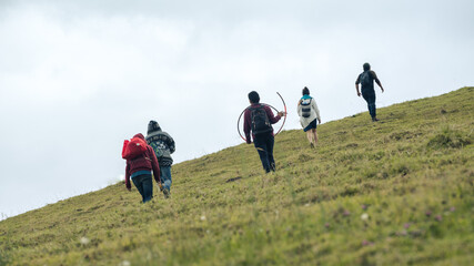group of people walking in the countryside