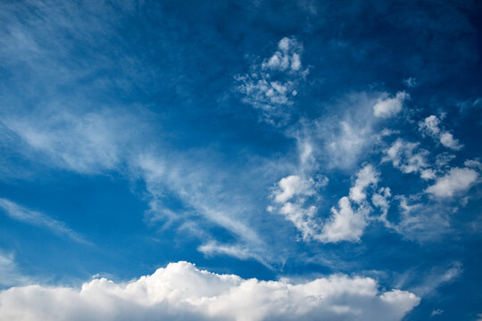 Vivid blue sky with crisp white clouds. © Jaco