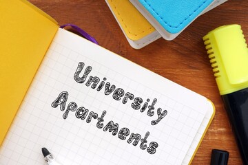 Business concept about University Apartments with phrase on the page.