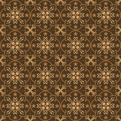 The beautiful motif on Javanese batik with seamless golden brown color