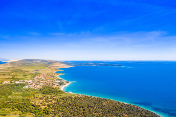 Fototapeta na wymiar Croatia, green side of the island of Pag, agriculture fields and Adriatic sea coastline