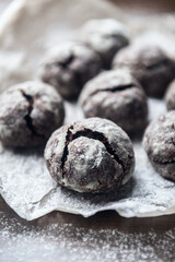 A few marble brown cookies close-up with powdered sugar