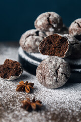 A few marble brown cookies close-up with powdered sugar