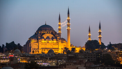 Sunset in Istanbul, Turkey with Suleymaniye Mosque (Ottoman imperial mosque). View from Galata Bridge in Istanbul.