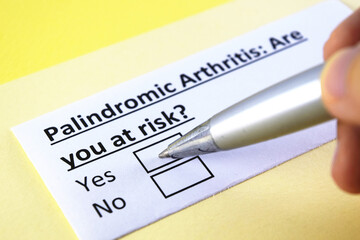 Fototapeta premium One person is answering question about palindromic arthritis.