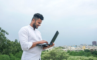 young man working on laptop