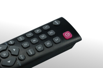 TV remote controle isolated on white gradient background.
