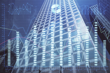 Forex chart on cityscape with tall buildings background multi exposure. Financial research concept.