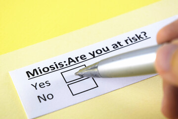 Obraz premium One person is answering question about miosis.