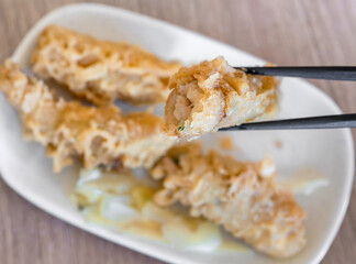 Fried shrimp roll - Taiwanese food cuisine in Tainan, Taiwan restaurant, close up, lifestyle.