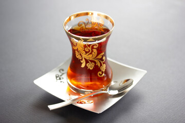 Turkish traditional tea, hot drink. Black tea.