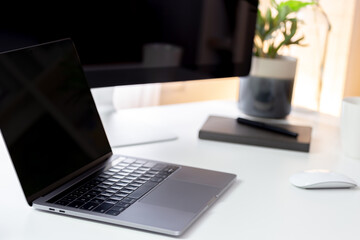 Working creative workspace with computer laptop with coffee cup and notebook, Clean workplace with desktop computer, workspace work from home