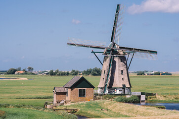 Fototapeta na wymiar Old Dutch windmill