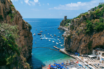 View of the bay, public beach of Marina di Praia. Mountain landscape coast of Italy, Amalfi. Sea and rocks, Tourists and vacations in Europe