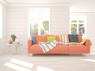 White stylish minimalist room with sofa and summer landscape in window. Scandinavian interior design. 3D illustration