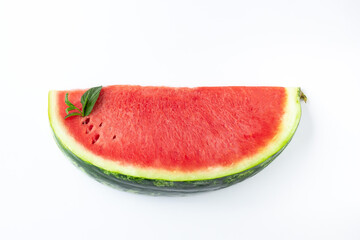 Sliced of fresh red ripe watermelon with mint on white background