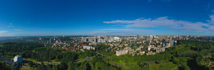 Fototapeta na wymiar Aerial Panoramic shot in the summer afternoon over Pechersky district of Kiev from the Botanical Garden.