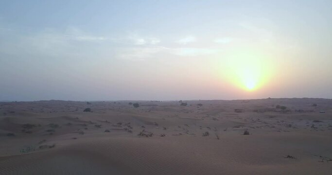 Sunset And Landscape View Of The Ras Al Khaima Desert In United Arab Emirates - aerial shot